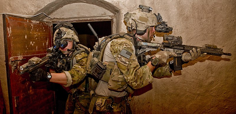 An Afghan and coalition security force conduct room searches in which they detained eight suspected insurgents during an operation to arrest a Taliban leader in Nahr-e Saraj district, Helmand province, Afghanistan on August 15, 2012. (Department of Defense Photo by U.S. Army Spc Justin Young) Released. Author: DVIDSHUB
